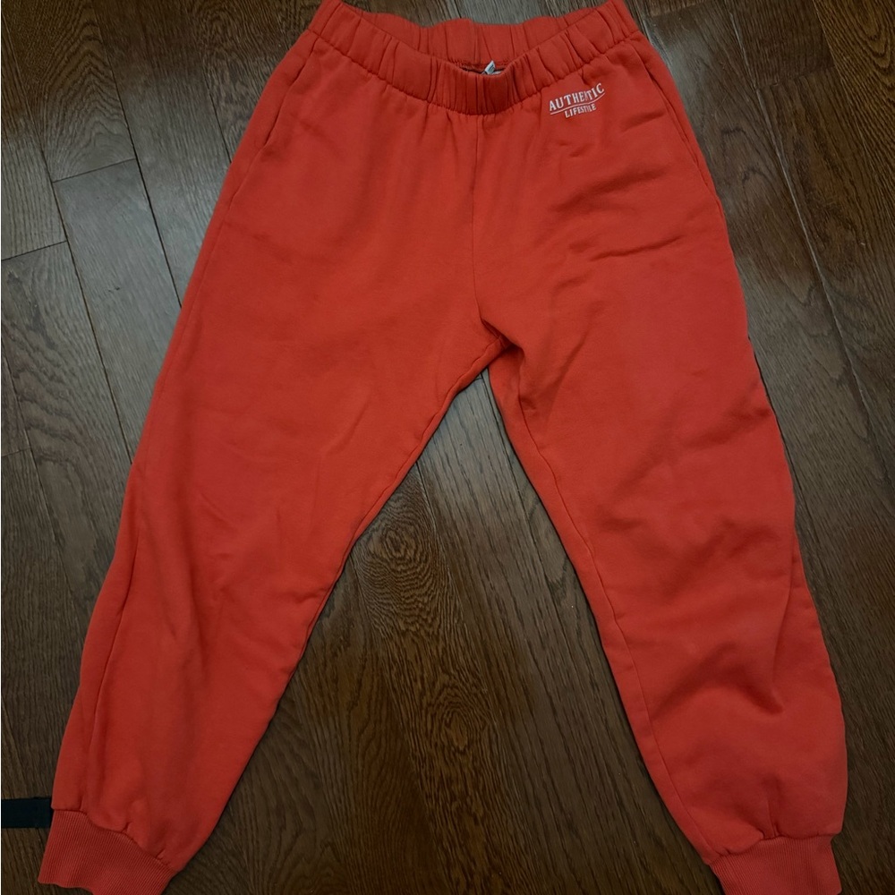 Divided Bold Orange Joggers